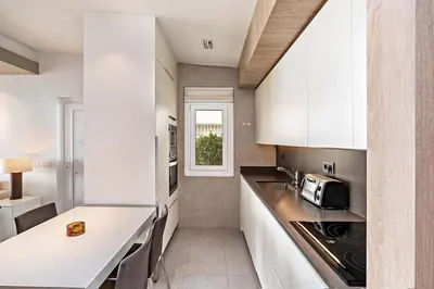 Una cocina o zona de cocina en BUNGALOW PIE DE PLAYA B30