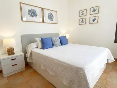 Cama o camas de una habitación en Casas de la Loma, Macenas Resort