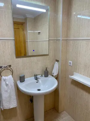 Un baño de Acogedor apartamento en la playa vera