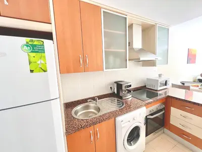 Una cocina o zona de cocina en BORA BORA Ático con piscina privada en Vera Paraíso